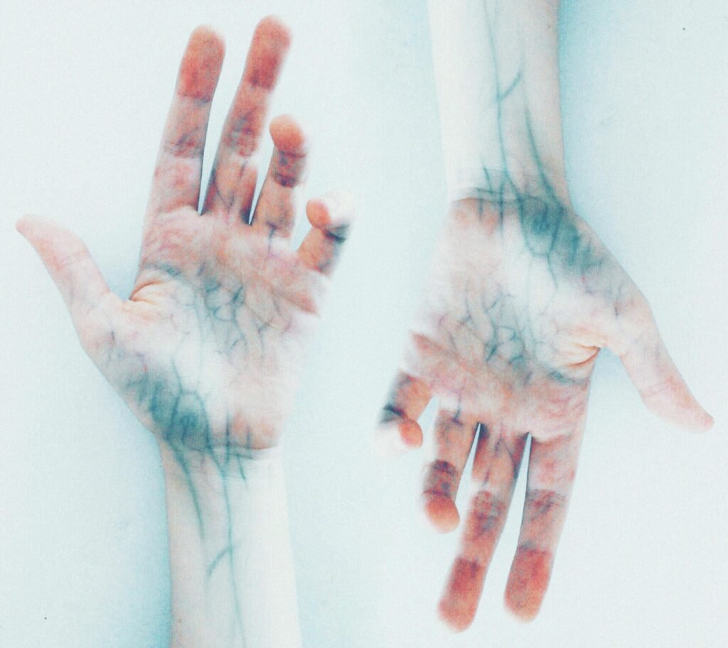 Photo of Hands with blue veins